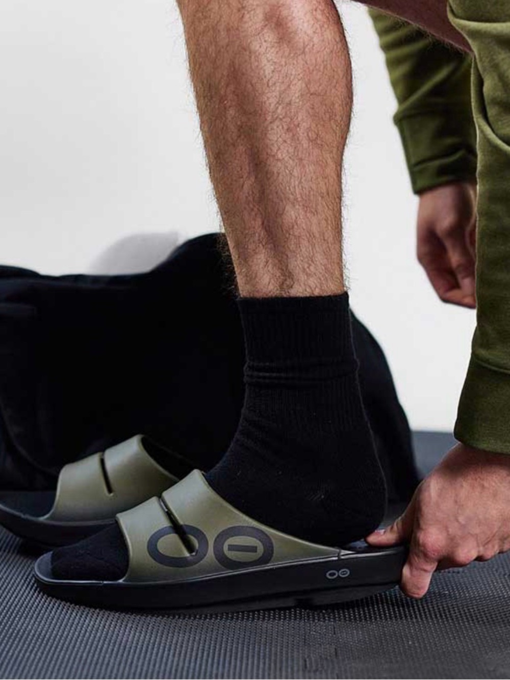 OOFOS
Olive Green and Black Slide
Sandals